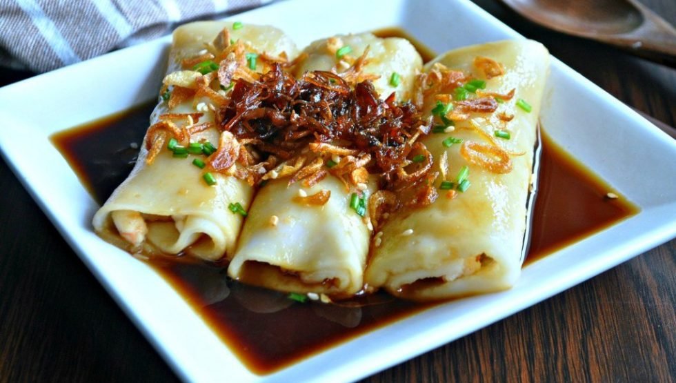 Cheon Fun (rice noodle rolls filled with beef, barbecued pork or steamed shrimp, and often topped with sweet soy sauce sprinkled with sesame seeds.